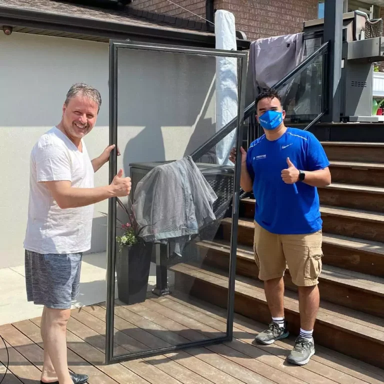 Customer approving finished residential window cleaning after service in Vaughan